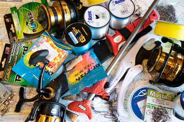 Surf Fishing Gear With Reels and Tackle Over NOAA Chart
